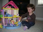 Addison and her doll house.